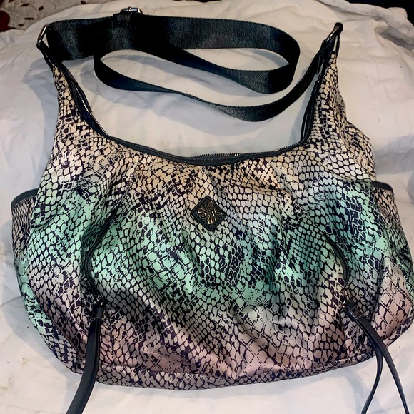Vera Wang hobo bag * 2 front zipper pockets
Side Pockets on each side Grey liner - Picture 1 of 4
